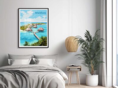 Framed Maldives poster in chic bedroom setting