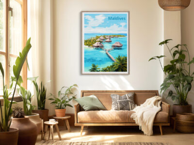 Sunlit lounge with plants and Maldives wall art.