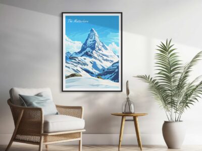 Living room with mountain artwork and green plant.