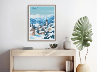 Framed mountain village artwork above wooden console.