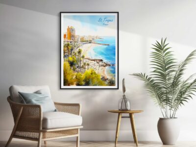 Framed watercolor of St. Tropez beach in room.