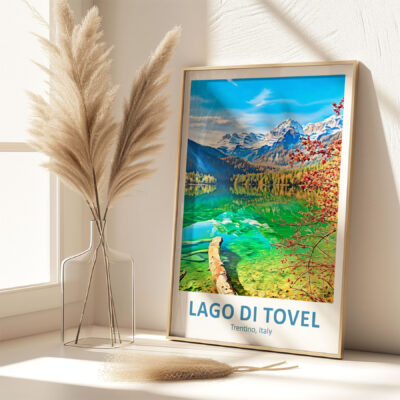 Framed Lago di Tovel poster on sunlit shelf.