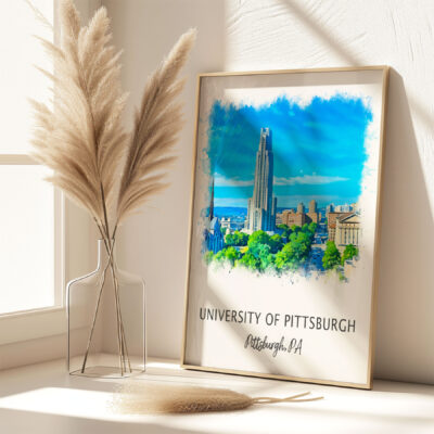 University of Pittsburgh skyline art framed on table.