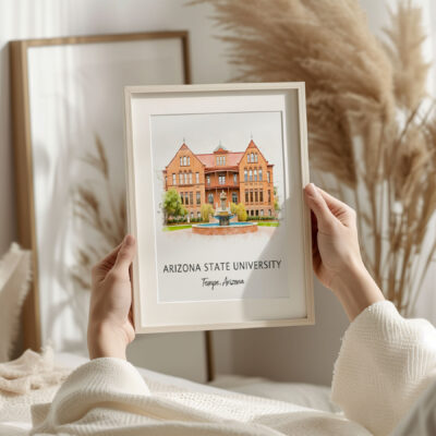 Framed Arizona State University illustration held in hands.